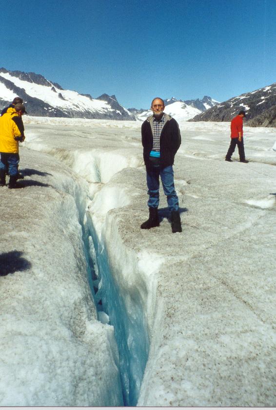 Photo of Tom Plymate standing on Mendenhall Glacier