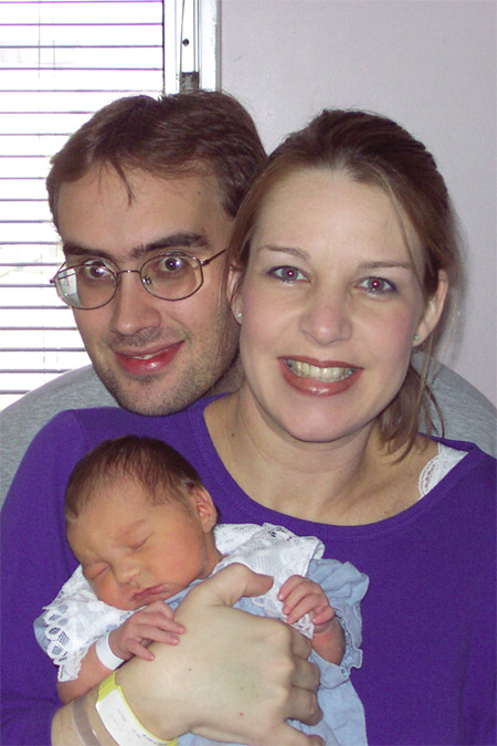 Photo of Brad and Julie Morton with newborn daughter Sophia