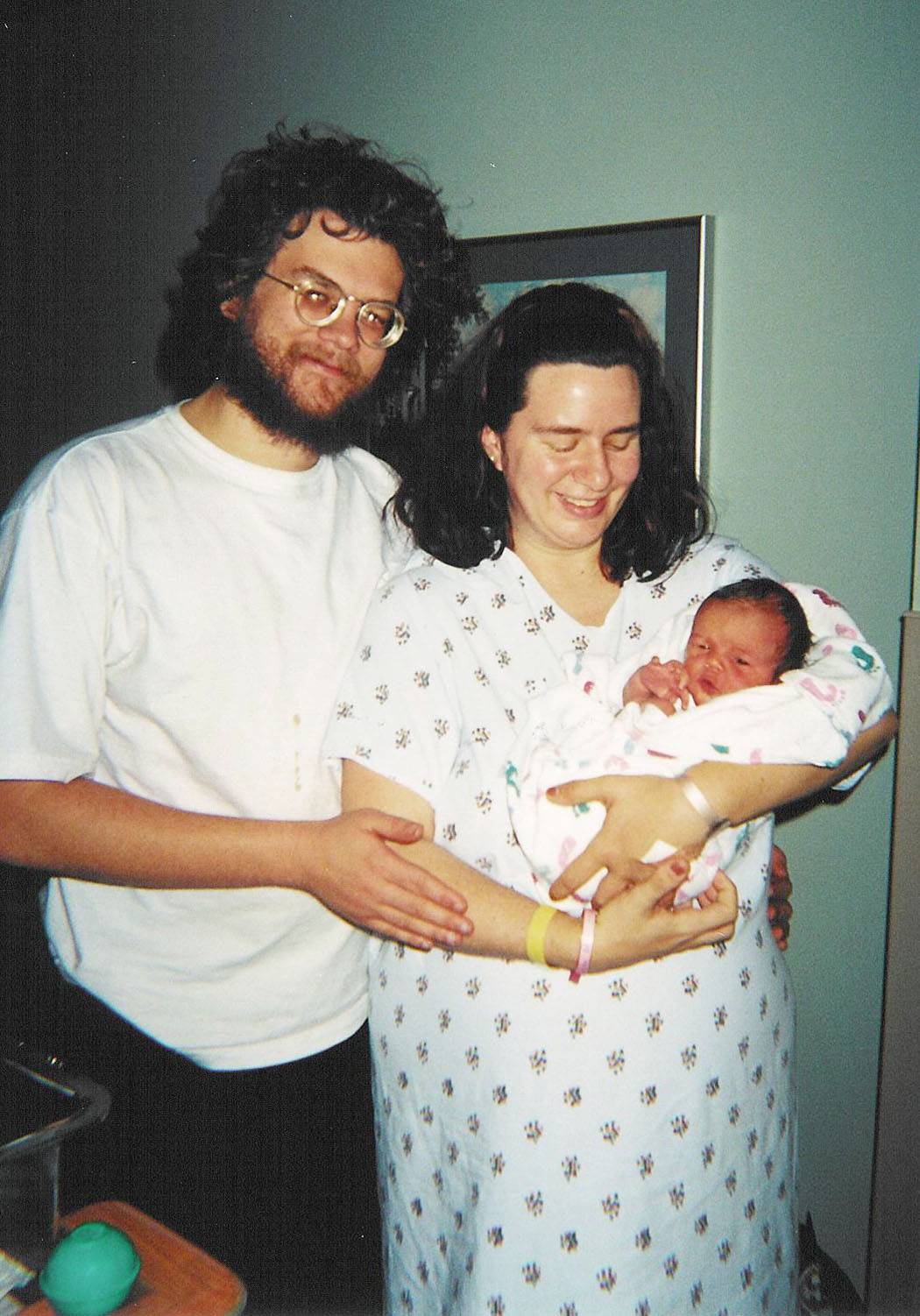 Photo of Brian & Robyn Morton with their new baby Alex, February 2002