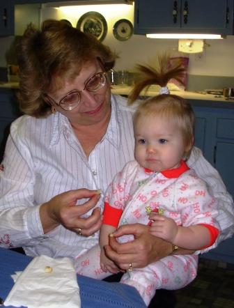 Photo of Ella Suzanne Morton with her Grandma Lynda, Christmas 2006